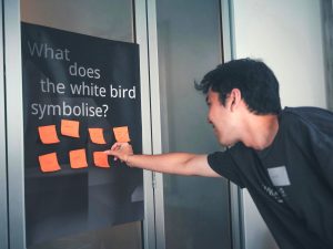Karaoke Poetry - What does the white bird symbolise?